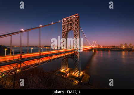 The George Washington Bridge spanning the Hudson River at twilight in New York City.