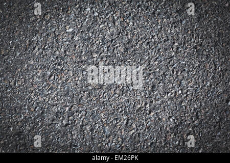 Asphalt background texture with some fine grain in it. Pavement Stock Photo