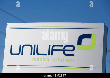 A logo sign outside the headquarters of the Unilife Corporation in York, Pennsylvania. Stock Photo