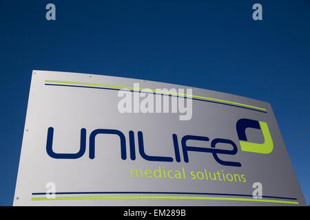 A logo sign outside the headquarters of the Unilife Corporation in York, Pennsylvania. Stock Photo