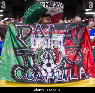 April 15, 2015: Mexico's fans in action against USA men's soccer at the Alamodome. San Antonio, Texas. Stock Photo