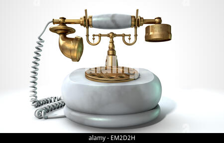 A vintage marble and brass telephone with a handset and dial embellishments on an isolated white studio background Stock Photo