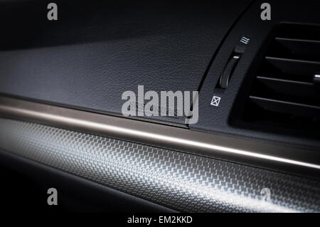 Modern car dashboard airbag closeup Stock Photo