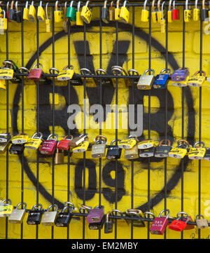 Lovers' locks hang attached to a fence in front of the emblem of Bundesliga soccer club Borussia Dortmund (BVB) at the Signal-Iduna-Park soccer stadium in Dortmund, Germany, 15 April 2015. Klopp has asked BVB  for the premature termination of his contract towards the end of the current Bundesliga season.  Photo: Friso Gentsch/dpa