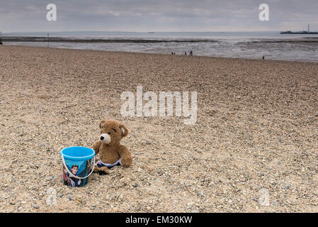 A teddy bear on Jubilee Beach in Southend on a cloudy day. Stock Photo