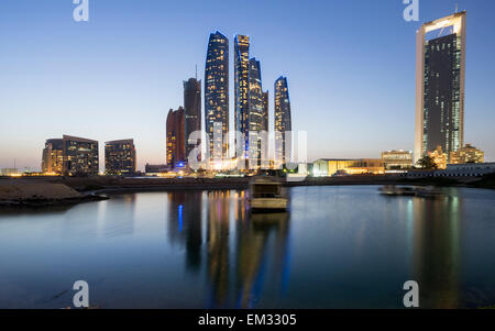 Night skyline view of Etihad Towers  in Abu Dhabi in United Arab Emirates Stock Photo