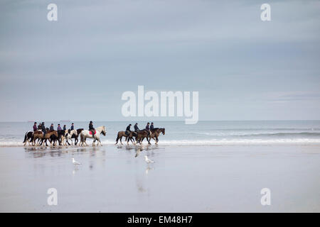 Horse Riding on the Beach, Saltburn, Cleveland Stock Photo