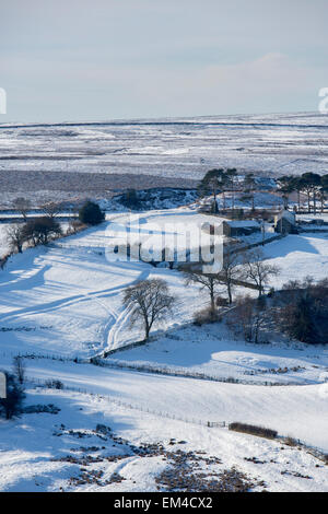 Commondale Moor and Farmhouse in Winter, North York Moors National Park Stock Photo