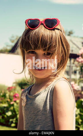 girl, daughter, light, green, blonde brown hair, smiling, happy bokeh, face pulling, forest , funny, shocked, sunglasses, heart Stock Photo