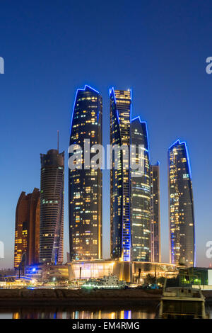 Night skyline view of Etihad Towers  in Abu Dhabi in United Arab Emirates Stock Photo