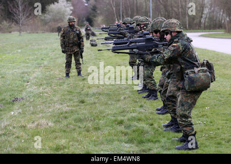 Husum, Germany. 16th Apr, 2015. Bundeswehr armed forces soldiers practice with G36 rifles during basic training in the Special Pioneer Battalion 164 in Husum, Germany, 16 April 2015. German Minister of Defence Ursula von der Leyen is visiting the battalion on Thursday and announced that the Bundeswehr wants to invest 60 million euros in the Husum site over the coming years. Photo: CHRISTIAN CHARISIUS/dpa/Alamy Live News Stock Photo