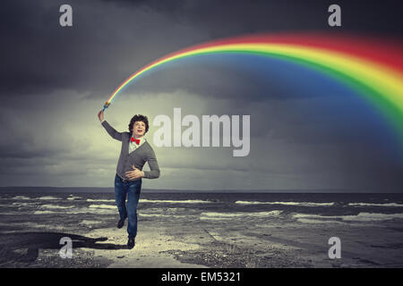 Young man and colour splash Stock Photo - Alamy