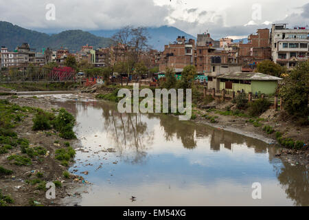 View of Kathmandu with a river in the foreground Stock Photo