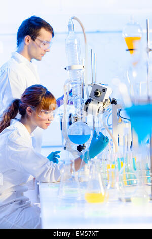 Young chemists in the laboratory. Stock Photo