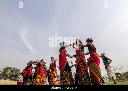 Sivasagar, Assam, India. 16th Apr, 2015. Indian Mising tribal youths perform a 'Bihu Dance' during Rongali Bihu celebrations in Sivasagar district of northeastern Assam state on April 16, 2015. The Rongali Bihu Festival is held in the first month of the Assamese calendar marking the begining of the Assamese New Year, which coincides with the start of spring in the Indian state of Assam. © Luit Chaliha/ZUMA Wire/ZUMAPRESS.com/Alamy Live News Stock Photo