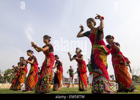 Sivasagar, Assam, India. 16th Apr, 2015. Indian Mising tribal youths perform a 'Bihu Dance' during Rongali Bihu celebrations in Sivasagar district of northeastern Assam state on April 16, 2015. The Rongali Bihu Festival is held in the first month of the Assamese calendar marking the begining of the Assamese New Year, which coincides with the start of spring in the Indian state of Assam. © Luit Chaliha/ZUMA Wire/ZUMAPRESS.com/Alamy Live News Stock Photo