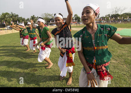 Sivasagar, Assam, India. 16th Apr, 2015. Indian Mising tribal youths perform a 'Bihu Dance' during Rongali Bihu celebrations in Sivasagar district of northeastern Assam state on April 16, 2015. The Rongali Bihu Festival is held in the first month of the Assamese calendar marking the begining of the Assamese New Year, which coincides with the start of spring in the Indian state of Assam. © Luit Chaliha/ZUMA Wire/ZUMAPRESS.com/Alamy Live News Stock Photo