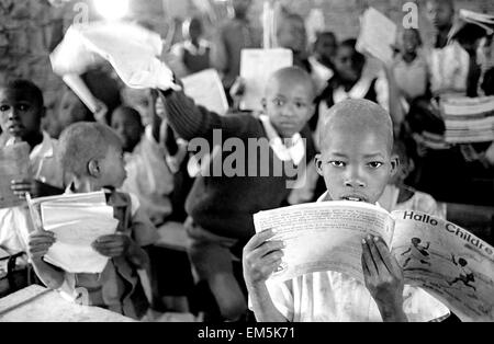 Children in a Catholic school ikutha, Kitui, Kenya. Education is the future not only the development of the country but of preventing diseases such as AIDS. In Kenya, 68% of children finish 5th grade of primary education and 31% of children and 28% of girls attending secondary classes. Stock Photo