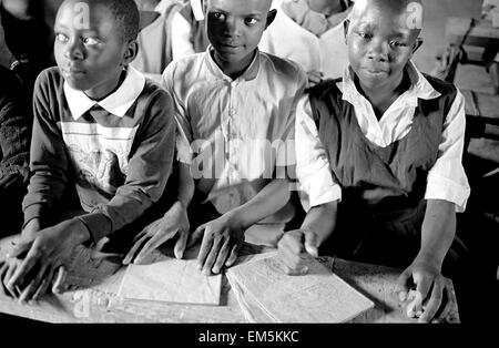 Children in a Catholic school ikutha, Kitui, Kenya. Education is the future not only the development of the country but of preventing diseases such as AIDS. In Kenya, 68% of children finish 5th grade of primary education and 31% of children and 28% of girls attending secondary classes. Stock Photo