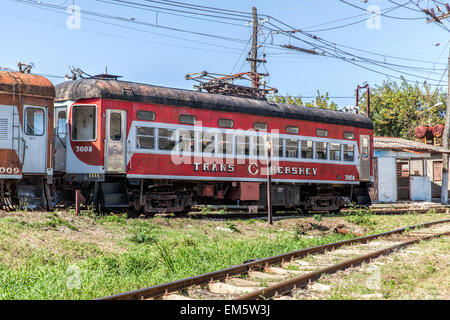 Old Hershey train carriage and track in a remote part of Cuba Stock Photo
