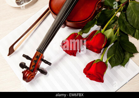 Red roses and a violin Stock Photo