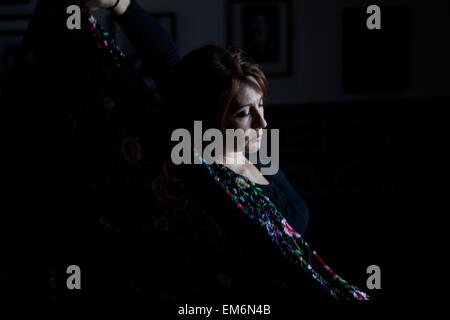 Olga Nuria, director of the Flamenco Dance group Savia Nueva performs a Petenera style dance in the Pena Cultural Flamenca La Petenera in Paterna de Rivera, Cadiz province, Andalusia, Spain Stock Photo