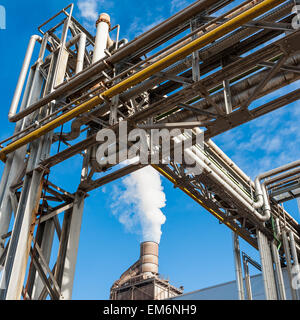 Chemical plant for the treatment of chipboard for furniture factory, with chimney Stock Photo