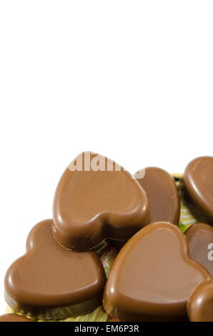 Deliciously looking heart shaped chocolate on white background Stock Photo