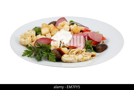Salad with crackers, beef and mushrooms on an isolated background Stock Photo
