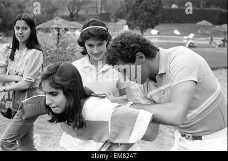 England goalkeeper Peter Shilton signs autographs for local girls in Mexico City ahead of the match against Paraguay at the 1986 World Cup tournament. June 1986. Stock Photo