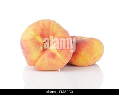 fresh asian flat peaches isolated Stock Photo