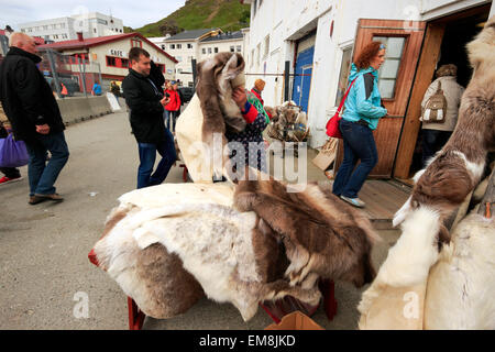 Fur pelts for sale outside a souvenir shop, Honningsvåg, Nordkapp, Finnmark, Norway, Scandinavia, Europe Stock Photo