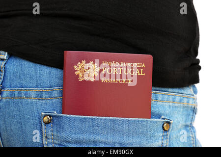 Portuguese passport carried in a rear pocket of jeans pants Stock Photo