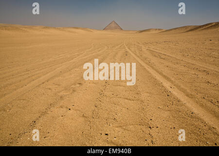 The Red Pyramid stands above over Dahshur necropolis desert. Believed to be the world's first successful attempt at constructing Stock Photo