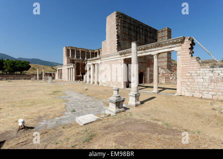 The remaining Palestra colonnade and the marble courtyard hall of the Roman Bath- Gymnasium complex. Sardis, Turkey. The double Stock Photo