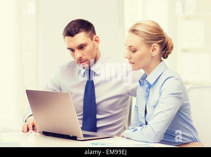 business team working with laptop in office Stock Photo