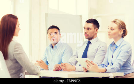 business team interviewing applicant in office Stock Photo
