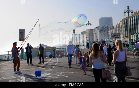 Unusual bubble blowing busker on Brighton seafront UK Stock Photo