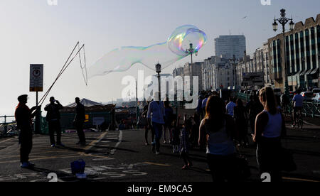 Unusual bubble blowing busker on Brighton seafront UK Stock Photo