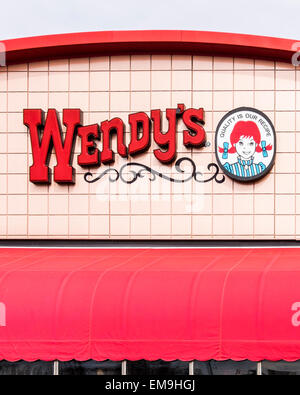 The exterior top front of a Wendy's hamburger business in Oklahoma City, Oklahoma, USA showing the Wendy's sign and logo.