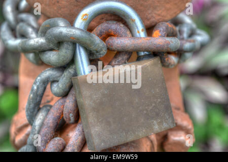 Macro shot of a rusty lock and chain Stock Photo