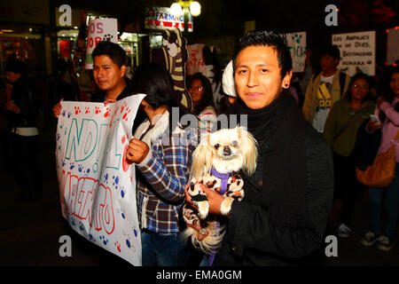 La Paz, Bolivia, 17th April 2015. Animal Rights campaigners march to demand the government passes laws to protect animals from abuse and trafficking, and to increase punishments for those found guilty of cruelty towards animals. Credit:  James Brunker / Ģ����ý Live News Stock Photo