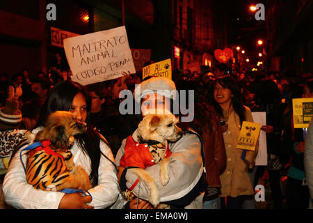 La Paz, Bolivia, 17th April 2015. Animal Rights campaigners march to demand the government passes laws to protect animals from abuse and trafficking, and to increase punishments for those found guilty of cruelty towards animals. Credit:  James Brunker / Alamy Live News Stock Photo