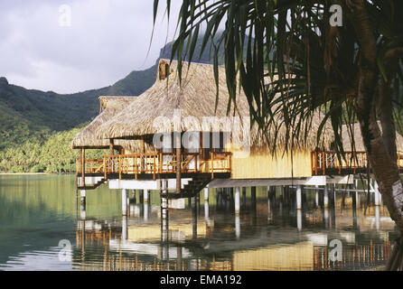 French Polynesia, Tahiti, Island Bungalows Of Sofitel Heiva Stock Photo