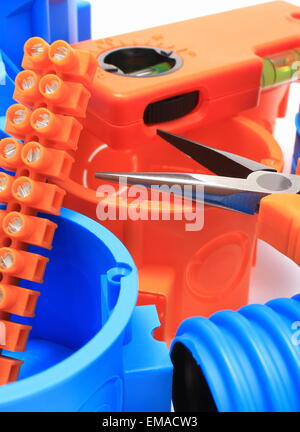 Electrical boxes and components for use in electrical installations, accessories for engineering jobs Stock Photo