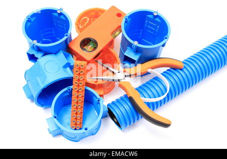 Electrical boxes and components for use in electrical installations, accessories for engineering jobs. White background Stock Photo