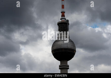 Berlin, Germany. 18th Apr, 2015. Clouds hang over the Fernsehturm TV tower in Berlin, Germany, 18 April 2015. Photo: Maurizio Gambarini/dpa/Alamy Live News Stock Photo