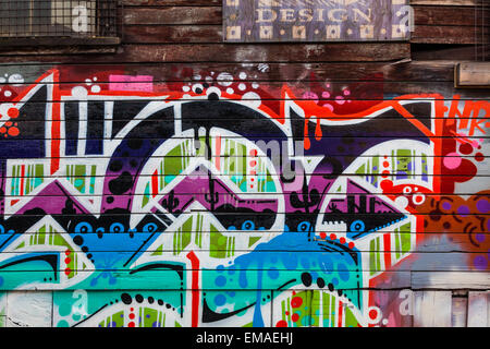 Example of street art on the walls of an old warehouse district on the east side of Vancouver, Canada Stock Photo