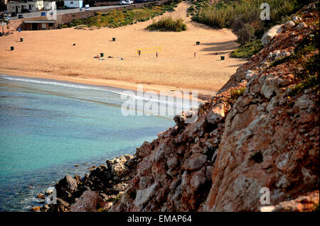 A volleyball game on a sandy beach near to Radisson 5 star Resort . Malta, Golden Bay. Stock Photo