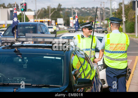 Sydney,Australia. 19th April, 2015. ANZAC commemorative and centenary march along pittwater road Warriewood to celebrate 100 years of ANZAC ( australian and new zealand army corps). New South Wales police officers on patrol  alamy live news Credit:  martin berry/Alamy Live News Stock Photo